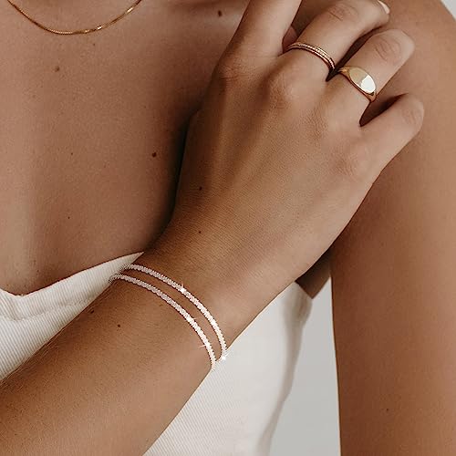 Ladies's Gold Stack Bracelets: Fashionable Set of Delicate 14K Gold-Plated Waterproof Adjustable Bracelets That includes Tennis, Beaded, Figaro, Rope, Paperclip, and Field Hyperlink Designs